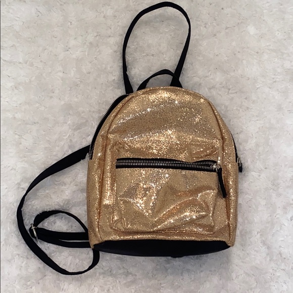 Rue21 Handbags - NWOT glitter mini backpack